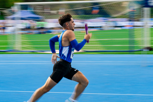 Athlete running - mushroom gummies for athletic performance